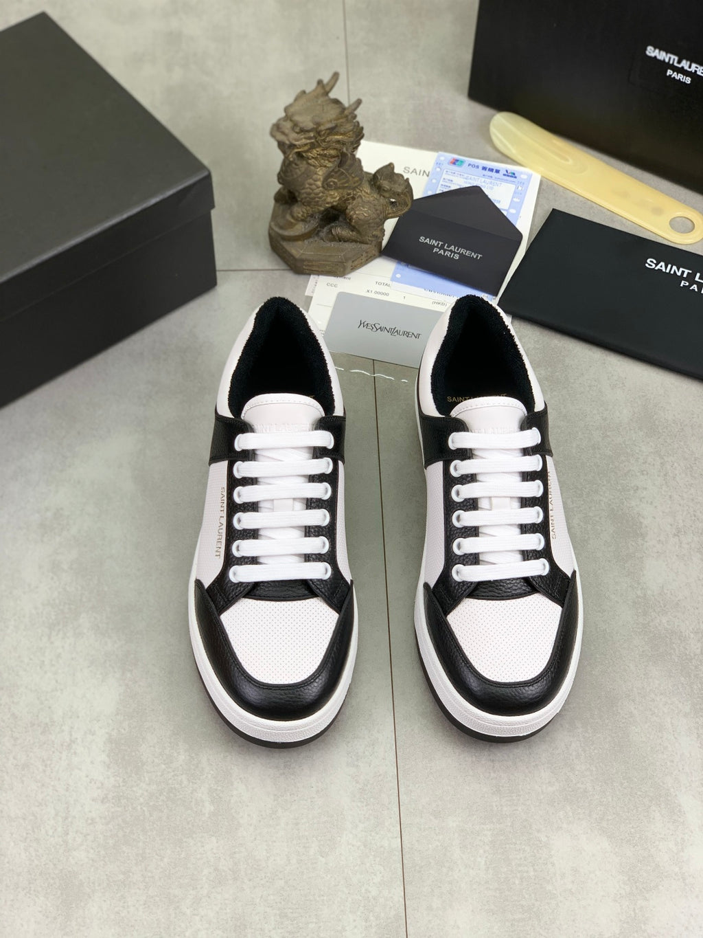 YSL unisex low-top sneakers, white laces, black and white upper, rubber sole