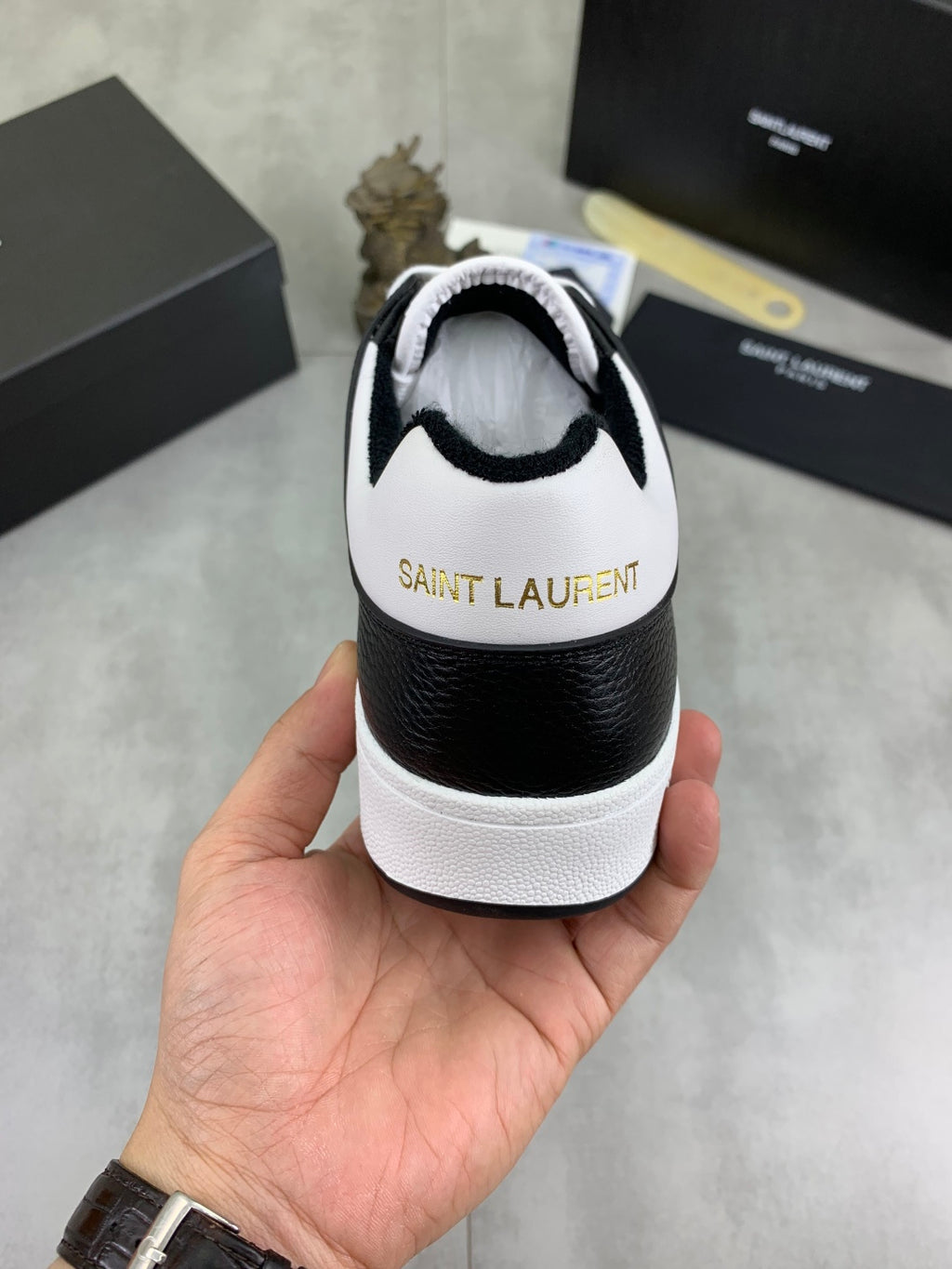 YSL unisex sneaker heel and back, white upper with black collar and rubber sole