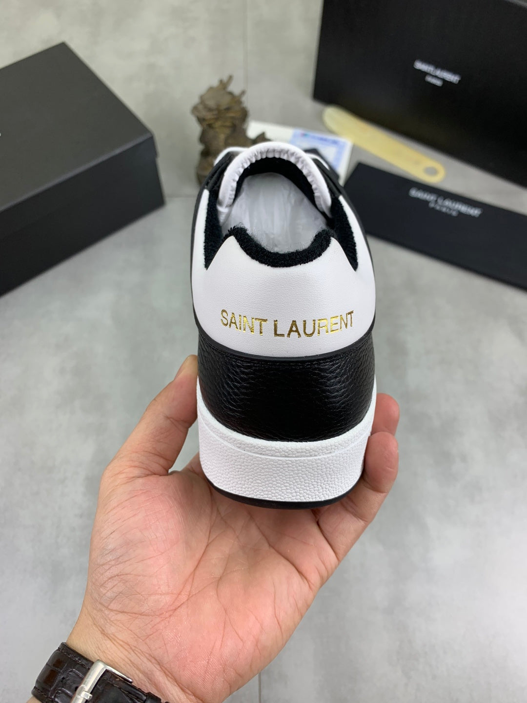 YSL unisex sneaker heel and back, white upper with black collar and rubber sole