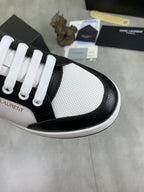 YSL unisex sneaker toe, black leather trim over white textured panels