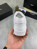 White sneaker heel with back logo patch and padded collar