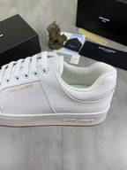 White low-top sneaker with embroidered side logo and cushioned collar