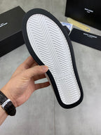 White unisex sneaker outsole with herringbone tread and dark edge trim