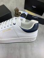 YSL unisex luxury shoes, white sneakers with navy-lined collar and embossed side logo