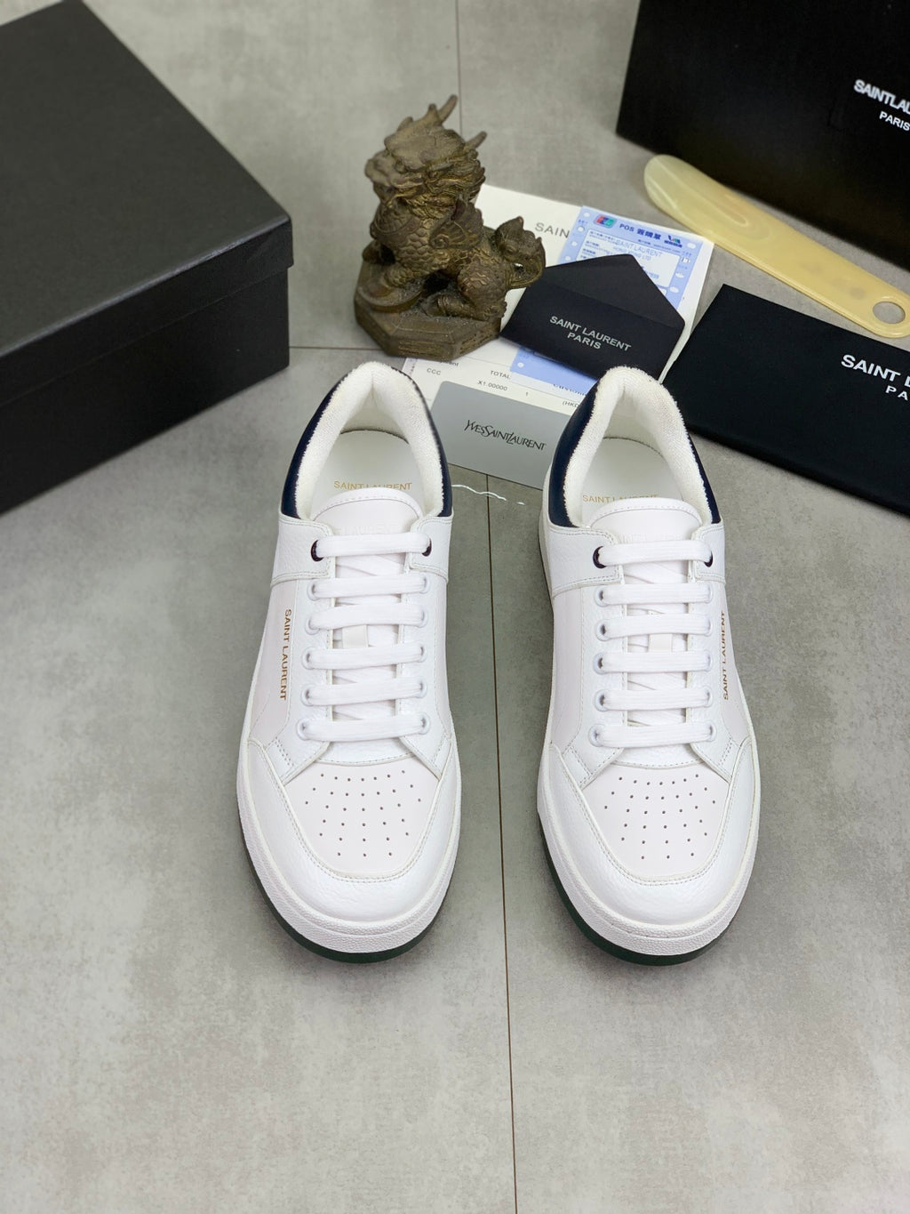 YSL unisex luxury shoes, pair of white sneakers with perforated toe and white laces