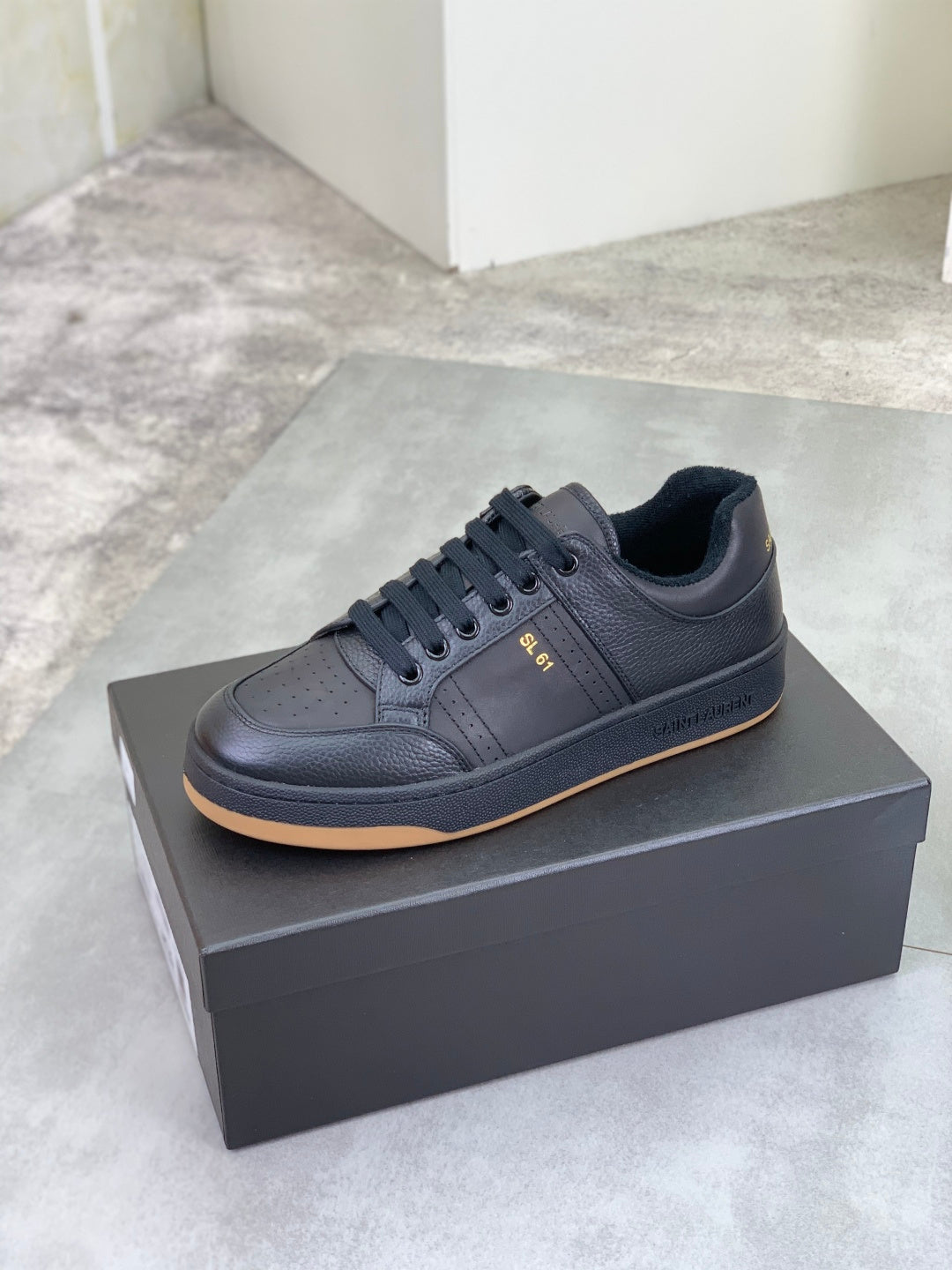 YSL unisex lace-up leather sneaker on box, dark blue-black with gum sole