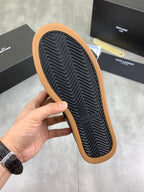 YSL unisex sneaker outsole tread with gum edge, dark blue-black upper
