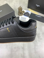 YSL unisex lace-up leather sneaker side view with branding and gum sole, dark blue-black