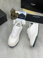 Two off-white leather sneakers with navy heel trim and white rubber sole
