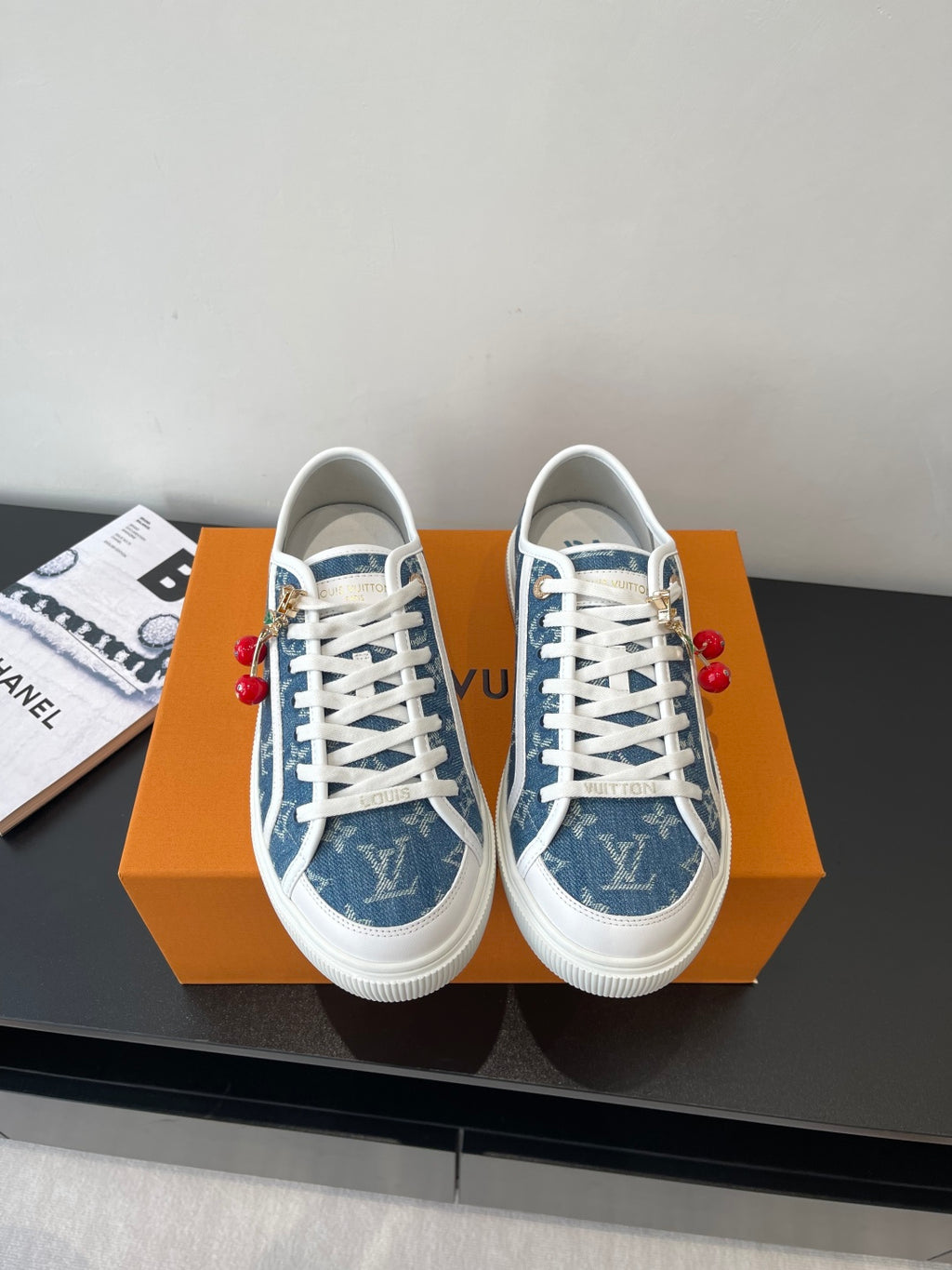 Louis Vuitton low-top sneakers in blue monogram canvas with white laces and rubber sole