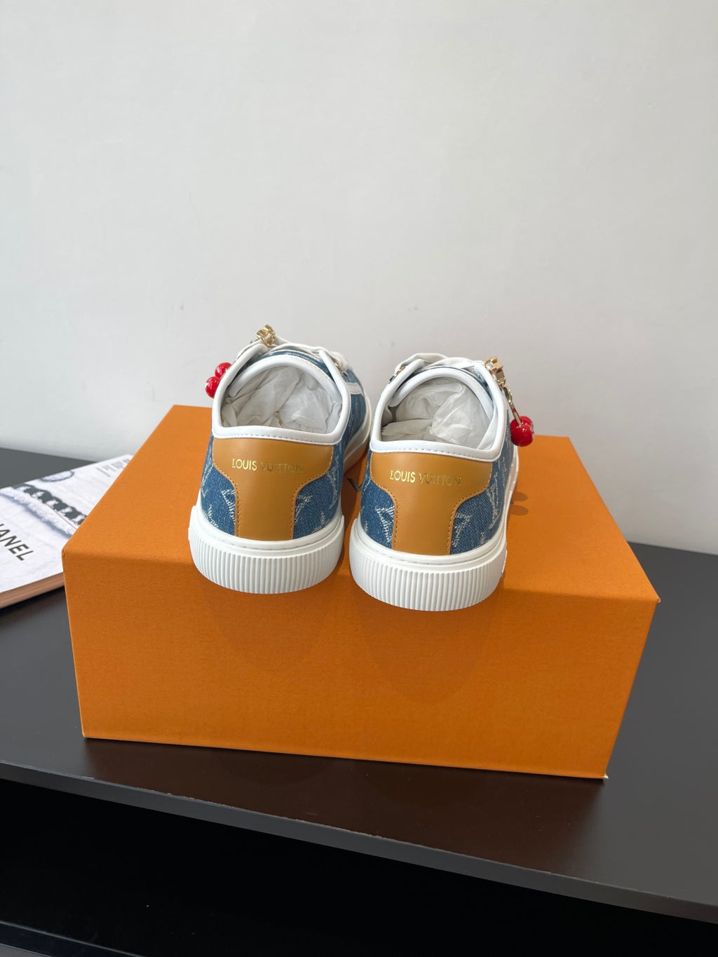 Louis Vuitton low-top sneakers heel view, blue monogram canvas with white rubber sole