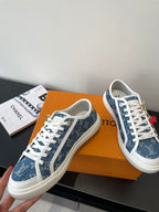Louis Vuitton low-top sneakers, blue monogram print with white laces and side stripe detail