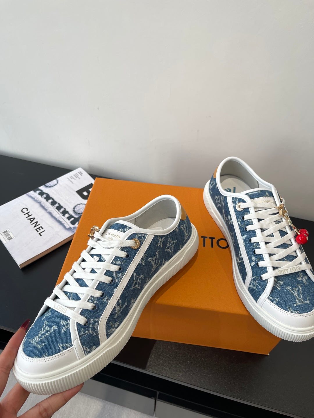 Louis Vuitton low-top sneakers, blue monogram print with white laces and side stripe detail