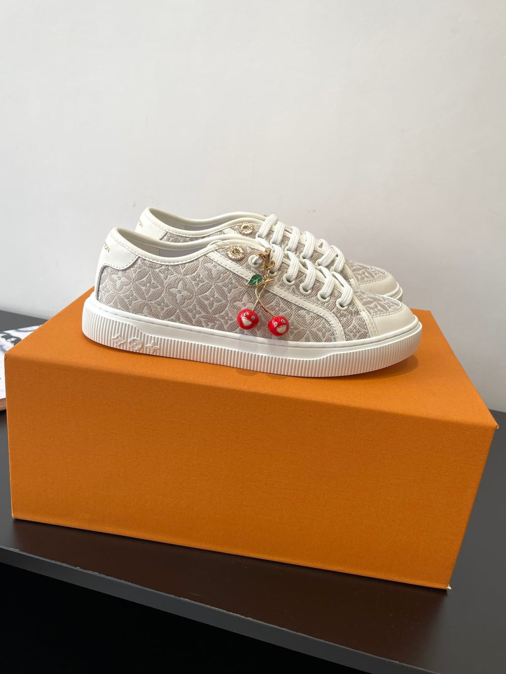 Louis Vuitton ladies lace-up sneakers, monogram canvas with gold eyelets and charms