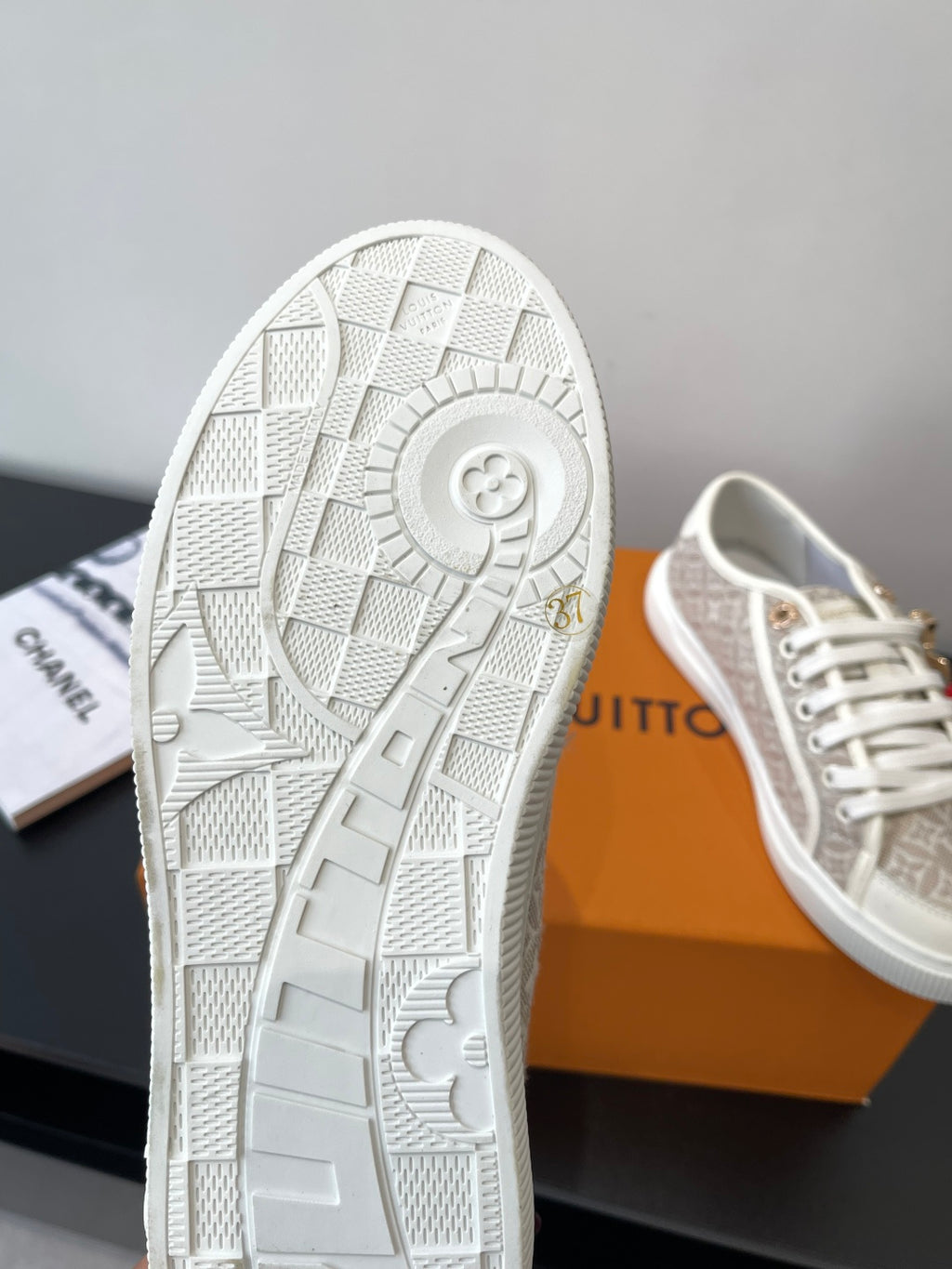 Louis Vuitton ladies sneaker outsole, textured tread with logo detail