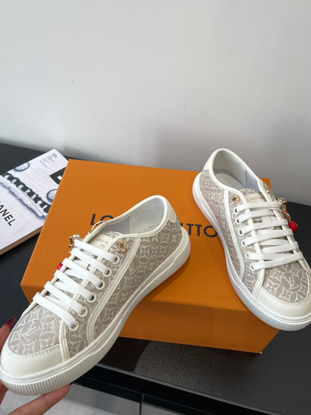 Louis Vuitton ladies lace-up sneakers, monogram canvas, red and green charm accents