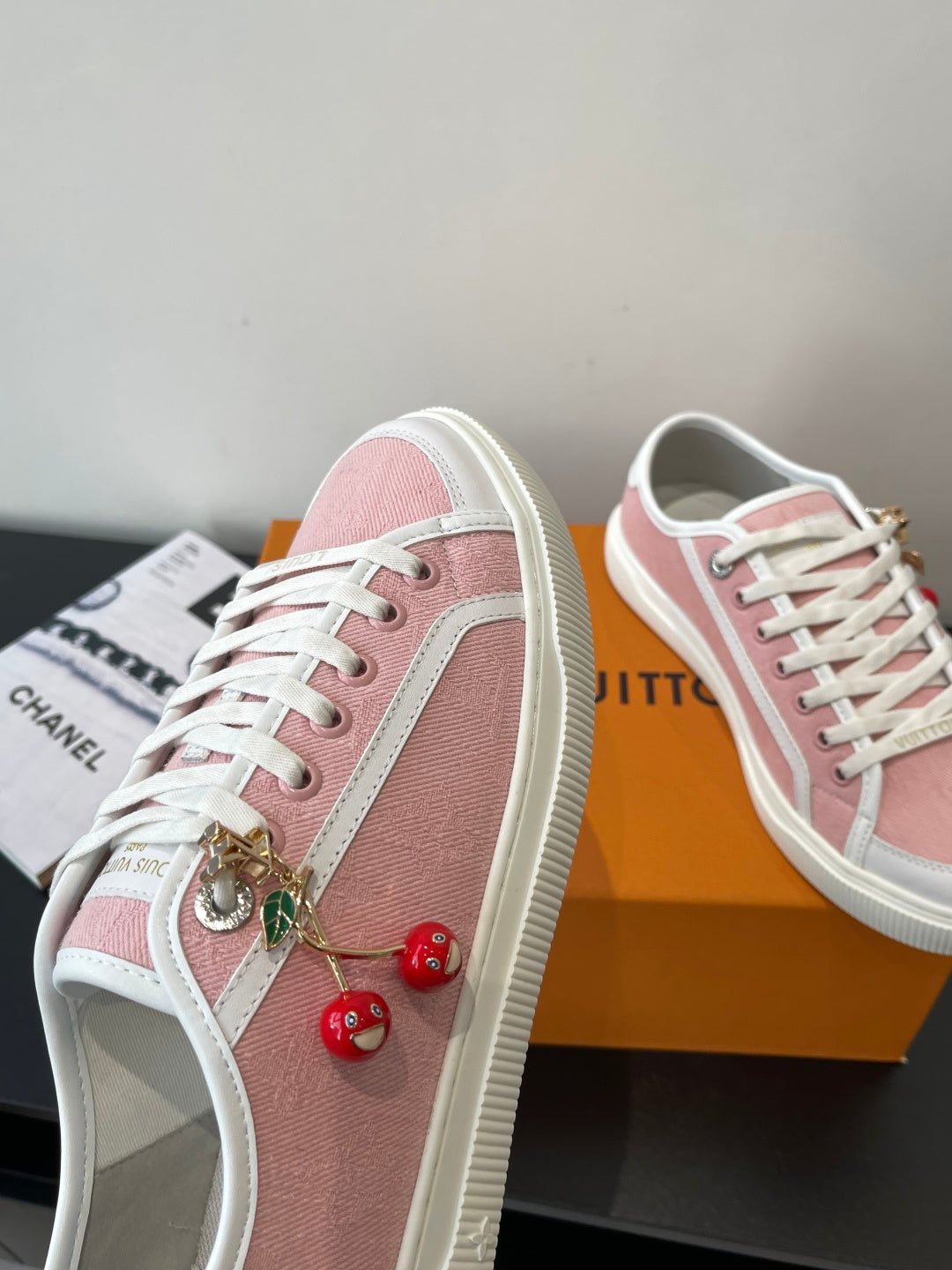 Louis Vuitton sneakers, pink canvas with white laces and cherry drop charm