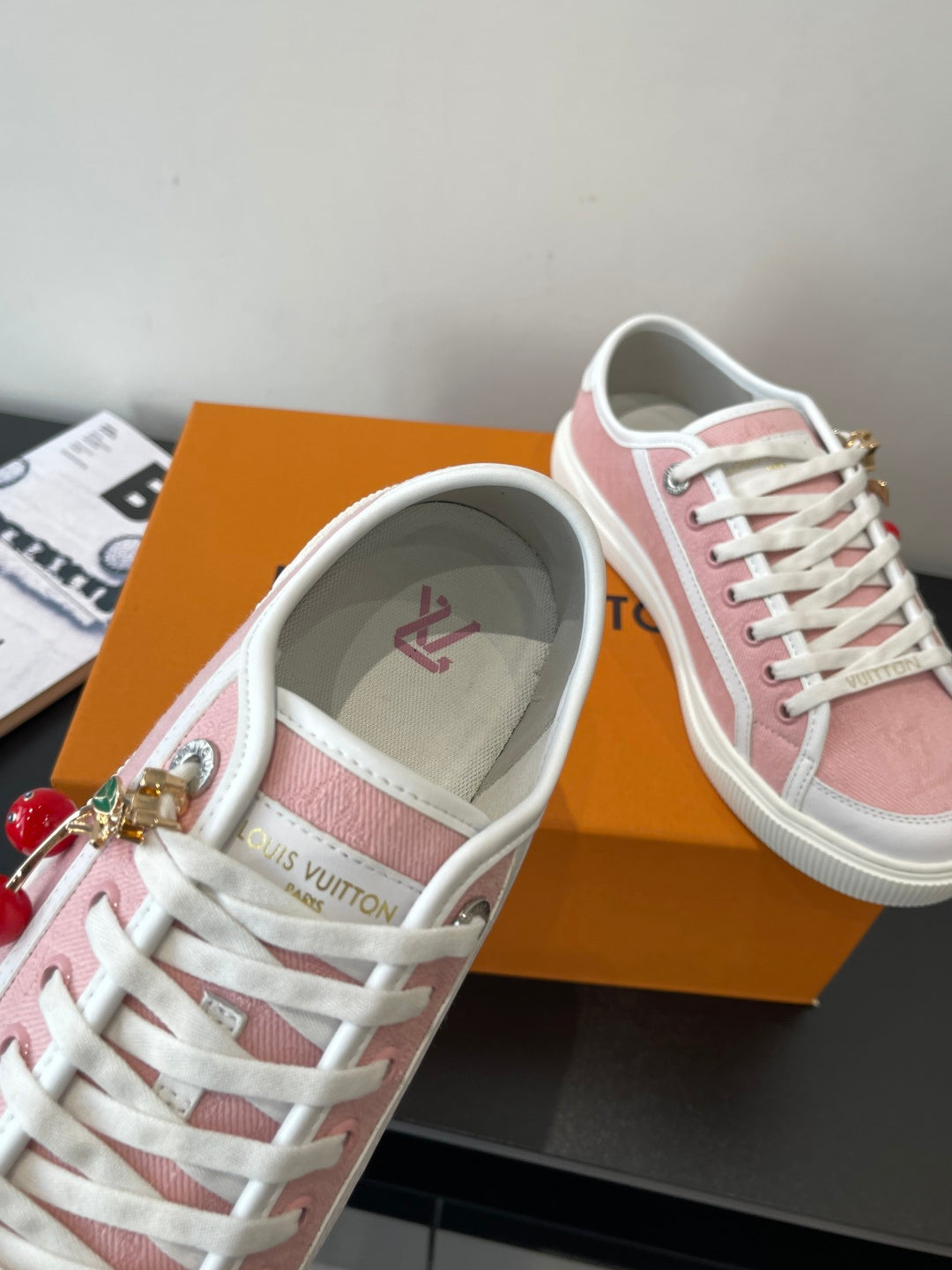 Women’s Louis Vuitton sneakers, pink canvas with white laces and side strap with charm