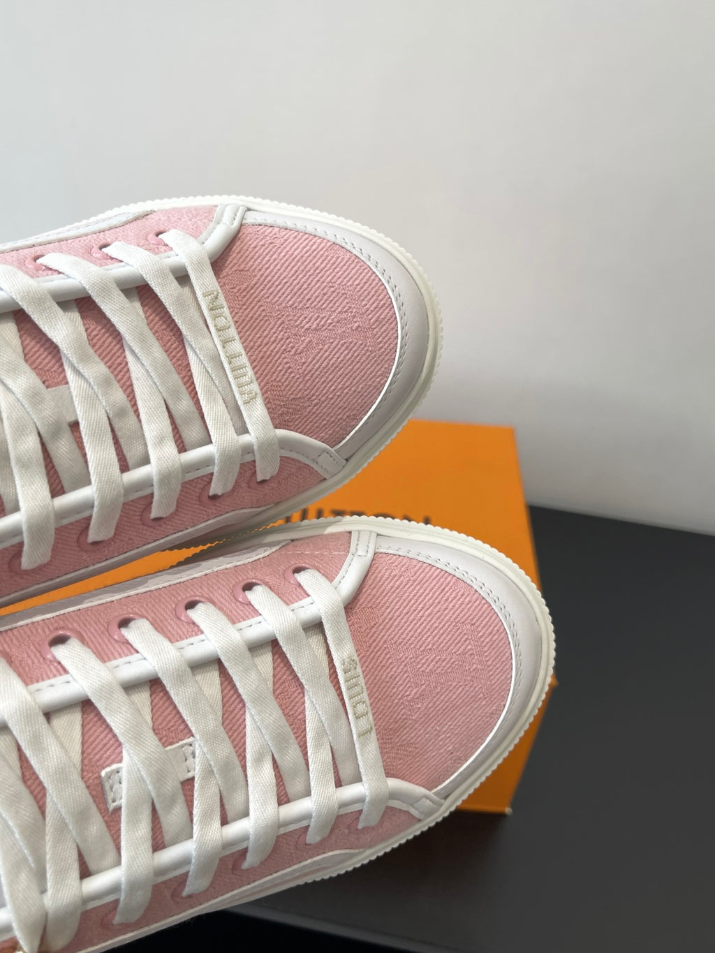 Louis Vuitton sneakers, pink textured canvas with white laces and stitched trim