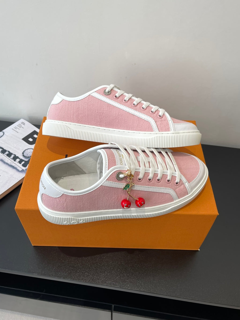 Louis Vuitton sneakers, pink upper with white laces and cherry side motif