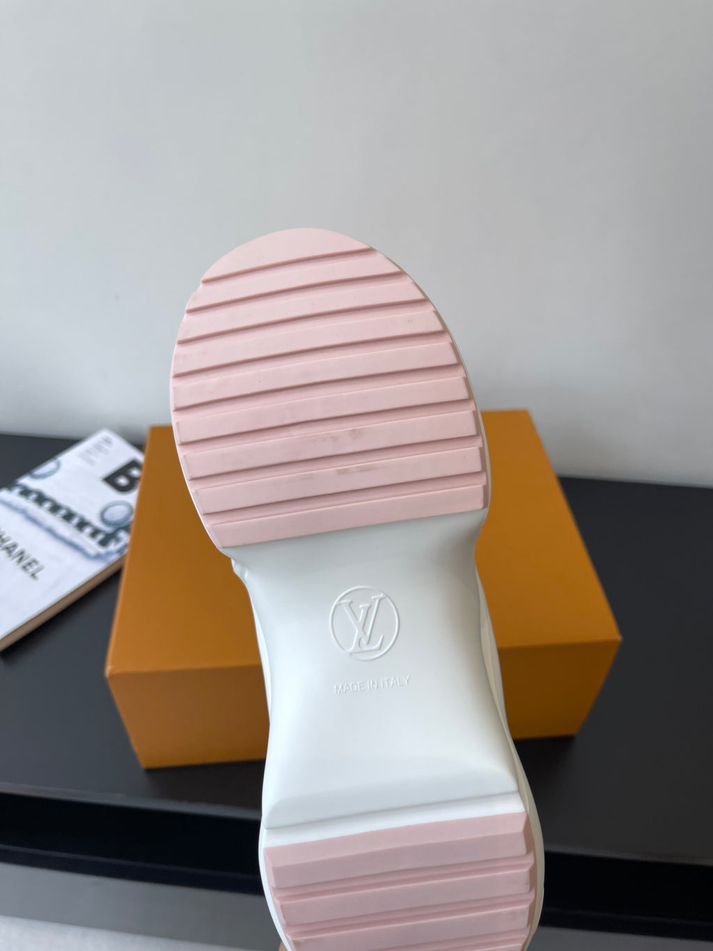Pink-striped rubber outsole with Louis Vuitton logo on heel