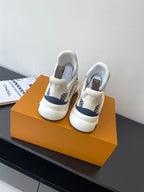 Louis Vuitton women's sneakers heel view, white leather with navy logo print