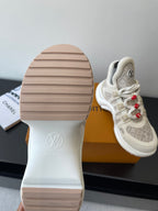 Louis Vuitton sneaker soles view, off-white rubber outsole with textured tread