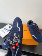 Louis Vuitton ladies navy sneakers, front view with lace-up and cherry charm