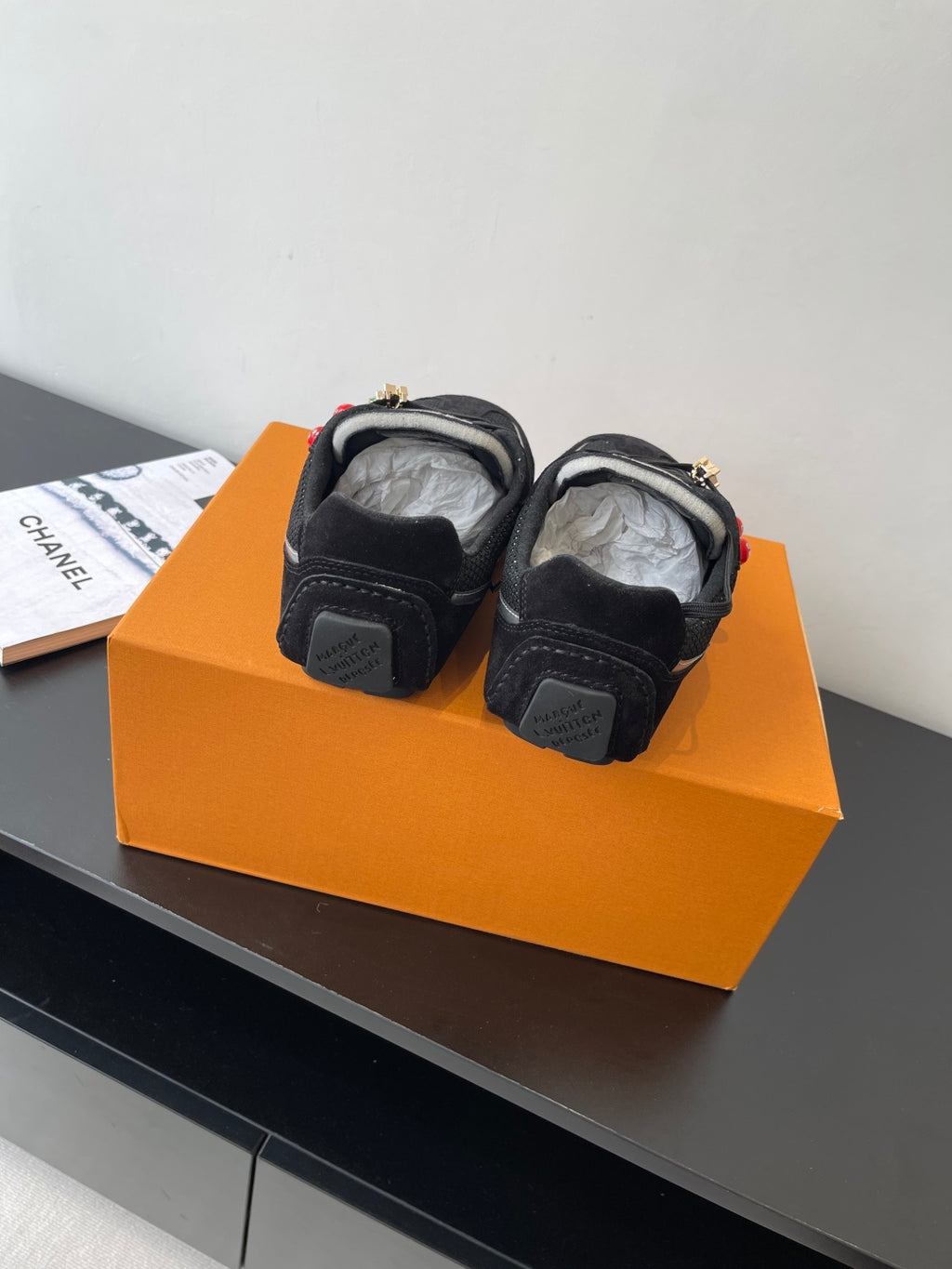Black Louis Vuitton sneakers, heel and back view with chunky sole