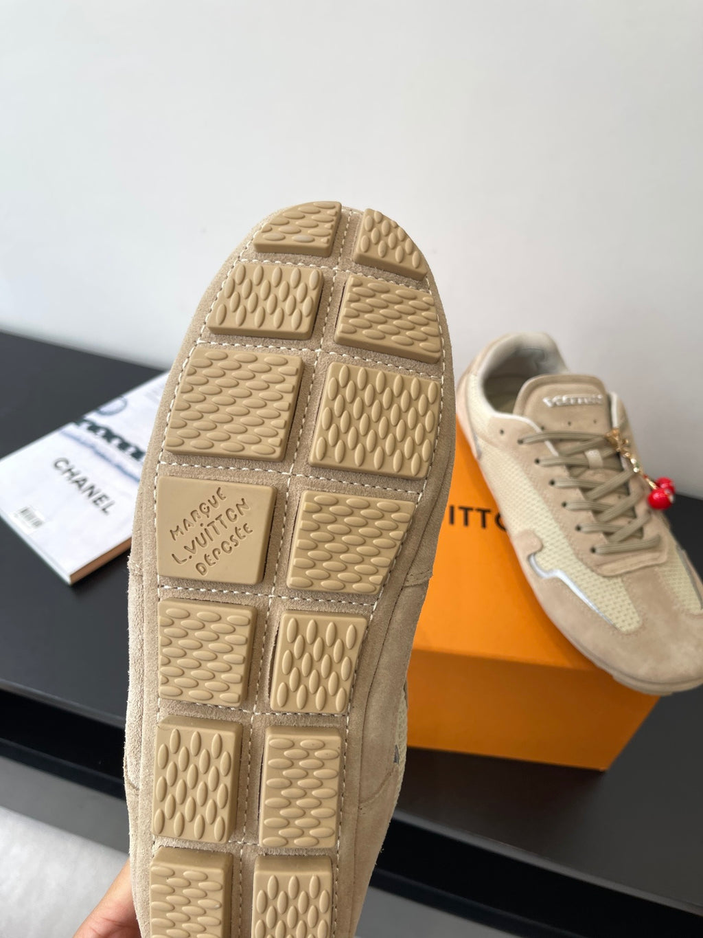 Beige Louis Vuitton ladies sneakers outsole with square tread pattern