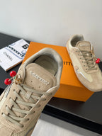 Beige Louis Vuitton ladies lace-up sneakers, toe and tongue view with logo patch