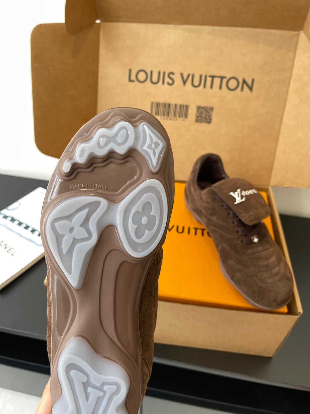 Brown suede sneakers with chunky rubber sole and side LV patch