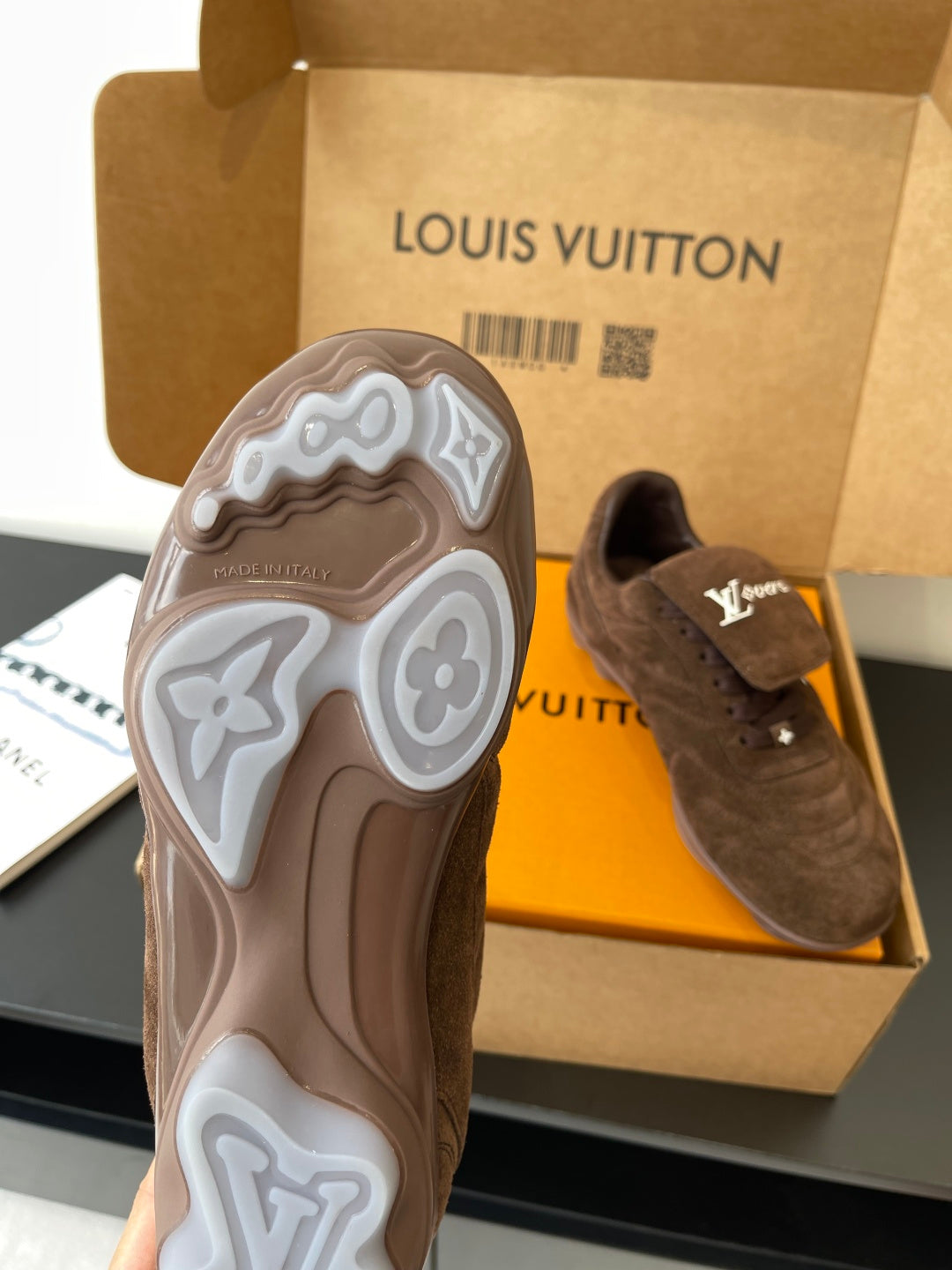 Brown suede sneakers with chunky rubber sole and side LV patch