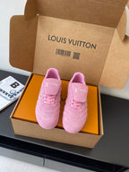 Louis Vuitton women's pink sneakers in open box, lace-up with logo details