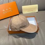 Louis Vuitton monogram baseball cap, beige with curved brim and embossed pattern