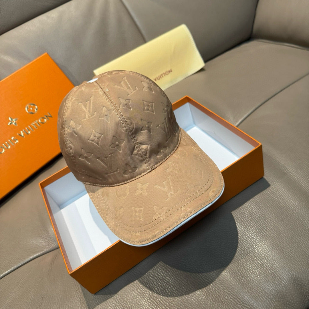 Louis Vuitton monogram baseball cap in beige with curved brim and stitched crown