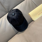 Louis Vuitton monogram baseball cap in dark black, side profile with round top button