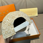 Louis Vuitton monogram baseball cap with black interior panel and light-blue strap tab