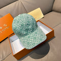 Louis Vuitton cap in green monogram pattern, curved brim, matching crown