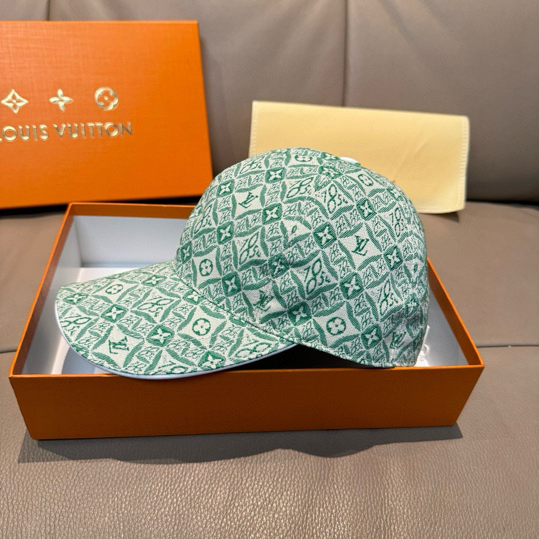 Louis Vuitton cap with green monogram pattern, front view, curved brim