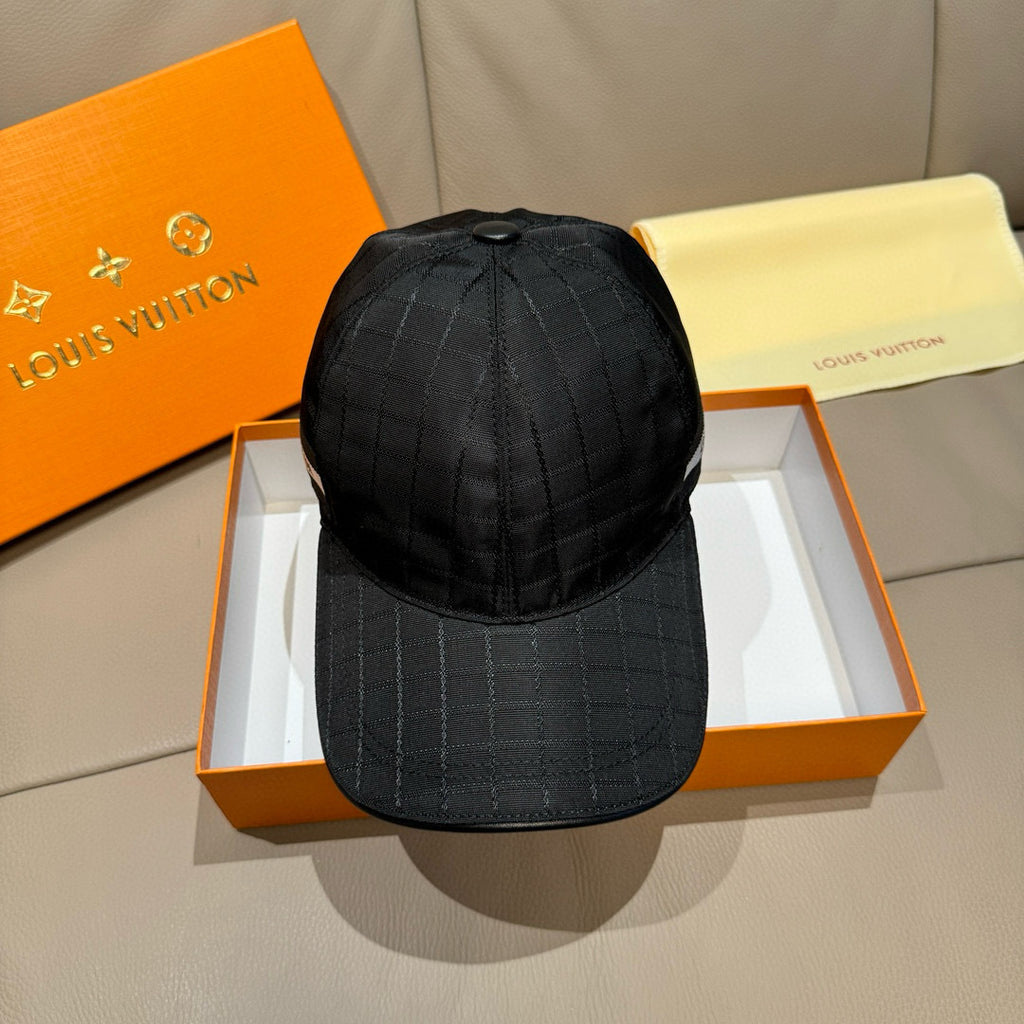Louis Vuitton dark baseball cap with adjustable back strap and stitched crown panels.