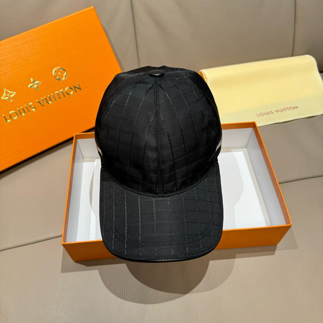 Louis Vuitton dark baseball cap with adjustable back strap and stitched crown panels.