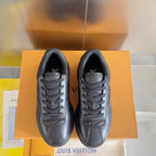 Black leather lace-up sneakers, front view pair with visible tongue logo