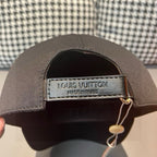 Black Louis Vuitton cap interior label: Louis Vuitton, made in Paris