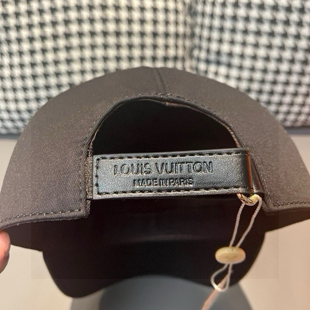Black Louis Vuitton cap interior label: Louis Vuitton, made in Paris