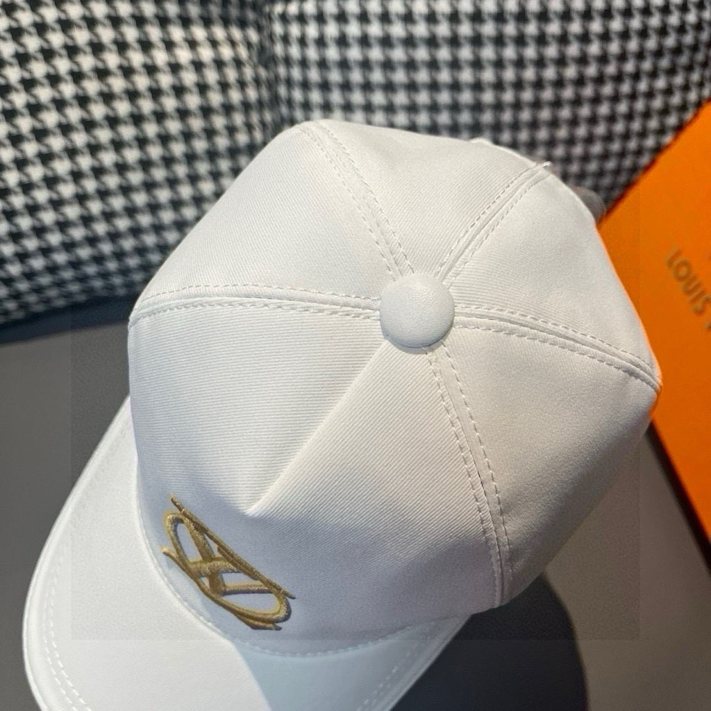Louis Vuitton cap, white with stitched crown seam and gold emblem