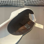Louis Vuitton cap, white interior view with attached brand tags