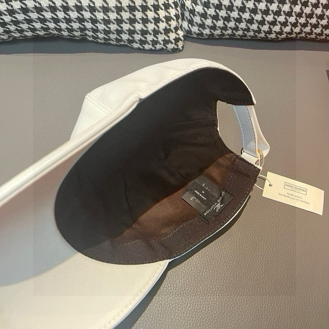 Louis Vuitton cap, white interior view with attached brand tags
