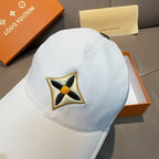 Light blue baseball cap close-up of embroidered star emblem on front panel.