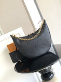 Louis Vuitton hobo bag in dark leather with embossed monogram and gold chain strap